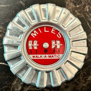 Vintage Silver and Red Walk-A-Matic Pedometer with original packaging
